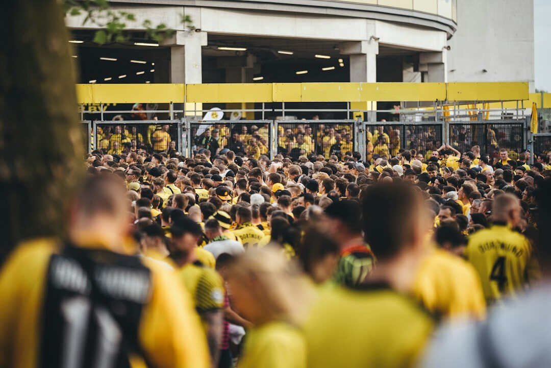 Football stadium filled with cheering fans during a match in Germany