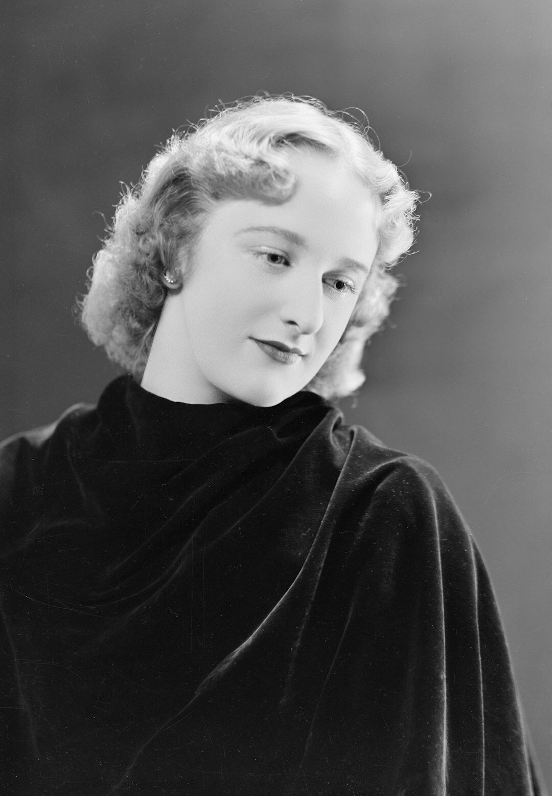 Studio portrait of a German woman editor-in-chief in her forties